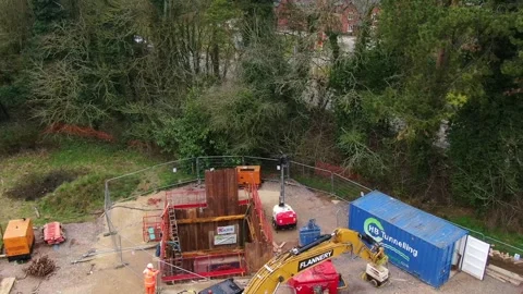 Underground Pipe Line Heavy Machine Work at British Village Site 库存影片 251697324