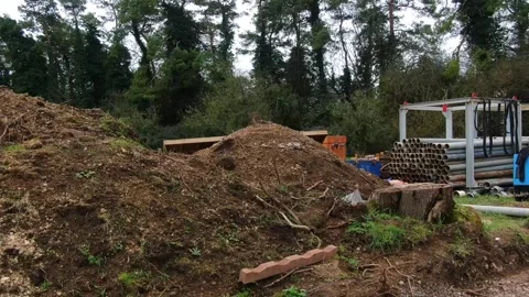 Underground Pipe Line Heavy Machine Work at British Village Site 库存影片 251697948