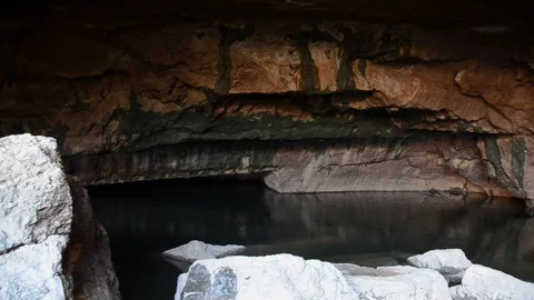 Underground river cave. River source. Cavern under a cliff Stock-Footage 101432206