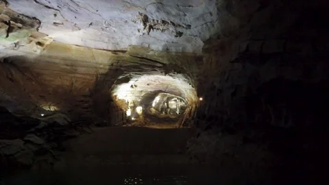 Underground river inside Phong Nha Cave Vietnam with limestone walls Stock Footage 335280304