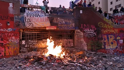 Underground station looted by protesters during latest riots at Santiago city Video stock 119572820
