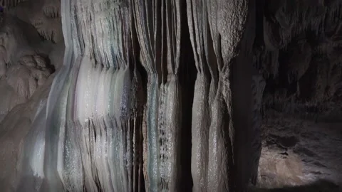 Underground stream and stalactites in the cave Stockbeeldmateriaal 170567979