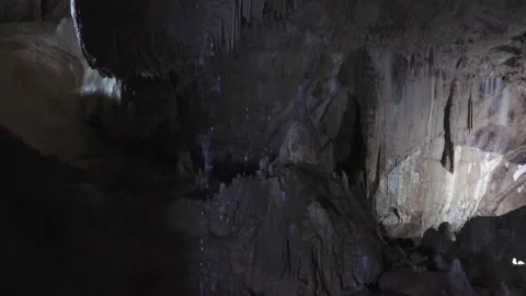 Underground stream and stalactites in the cave Stockbeeldmateriaal 170568021