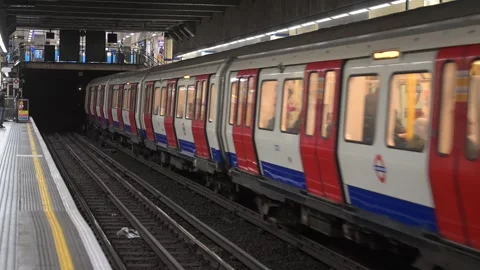 Underground Train Arrival at Aldgate East Station Video stock 335030590