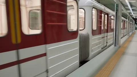 Underground train cars in subway quickly rush to next stop for passengers. Stock-Footage 232393735