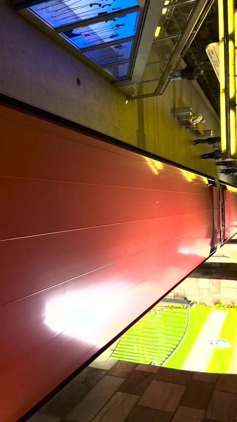 An underground train is leaving the station. An underground train in Nuremberg Stock Footage 274365994