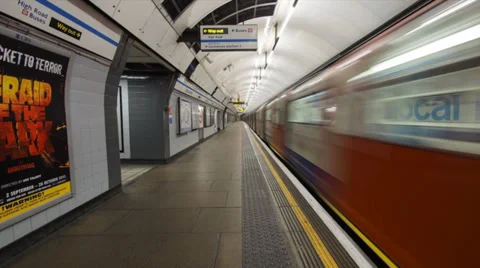 Underground Train in London with Doors Opening and People Exiting Stock Footage 34260604