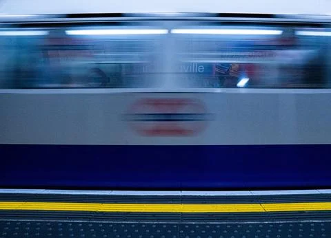 Underground Train Moving with Motion Blur in London Stock Photos