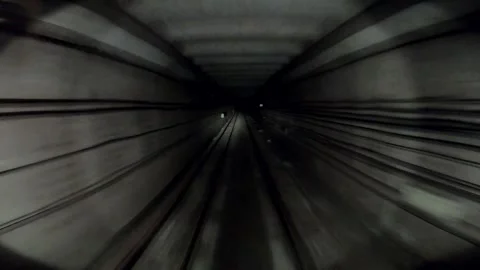 Underground train riding in darkness tunnel. Subway train moving at dark tunnel Stock Footage 302888292