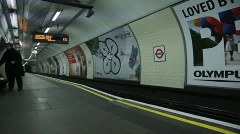 Underground train into station Stock Footage 11130359