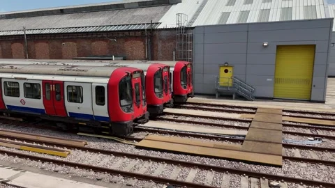 Underground Trains Outside the Depot Workshop at Ealing Common Stock Footage 343469106