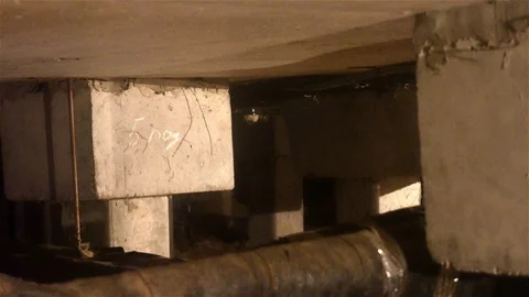 Underground utilities,mud sewer of one of the basements of apartment houses Stock Footage 83299329