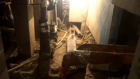 Underground utilities,mud sewer of one of the basements of apartment houses Stock Footage 83305204