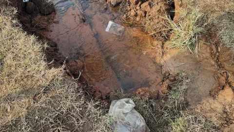 Underground Water Leak Seeping Through Soil Stock Footage 329660732
