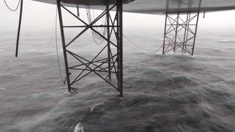 Underneath Jack Up Drilling Rig In The Ocean during storm condition Stock Footage 162750321
