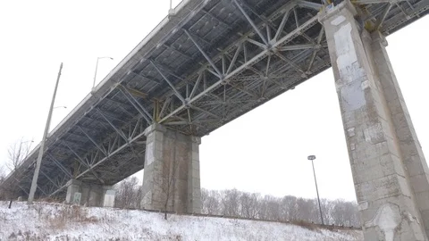 Underneath Leaside bridge in the Don Valley, Toronto, Canada. Snowstorm. Stock Footage 84031520