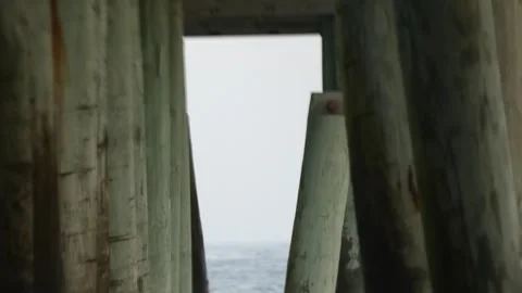 Underneath Pier at Beach 003 Video stock 255530115