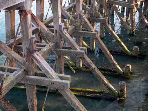 Underneath a pier, support beams Stock-Fotos