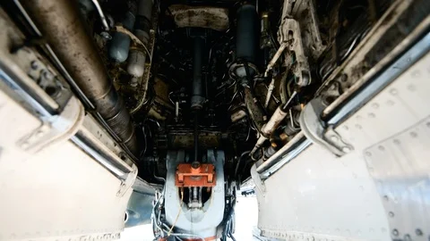 Underneath an RAF harrier jump jet, inside under the fuselage Stock Footage 113219476