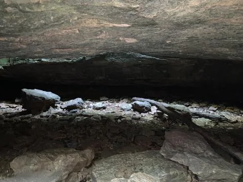 Underneath a rock bridge Stock Photos