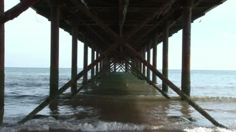 Underneath Seaside Pier Stock Footage 18010442