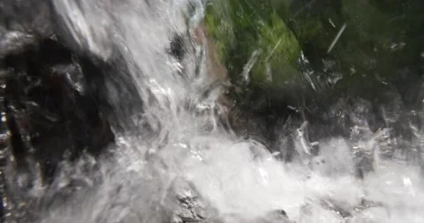 Underneath a small waterfall looking out P2080178-no-audio Stockbeeldmateriaal 238067761