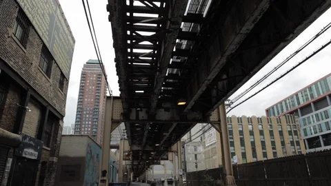 Underneath Train Passing on Tracks Video stock 112948295
