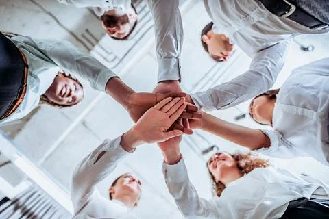 Underneath view, Business teamwork groups people hands, stacked huddle togeth Stock Photos