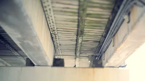 Underneath wodden cement bridge Stock Footage 8689588