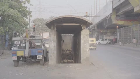 An underpass and its surroundings on a main street in Mumbai, India Stock Footage 345388796