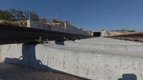 Underpass and tunnel for the construction of a new railway line. Detail of se Stock-Footage 107773104