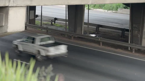 Underpass View of Sparse Morning Joburg Commuter Route Stock Footage 345003322