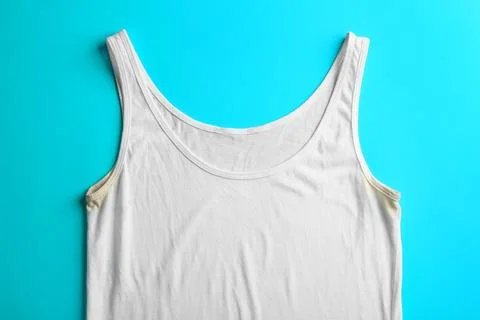 Undershirt with deodorant stains on light blue background, top view Stock Photos