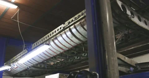 Underside of Aircraft Fuselage Structure with Frames, Workshop, Low Angle Stock Footage 340306400