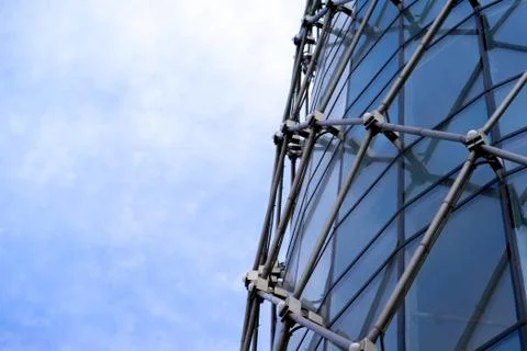 Underside angle view to background of modern glass building skyscrapers over Stock Photos
