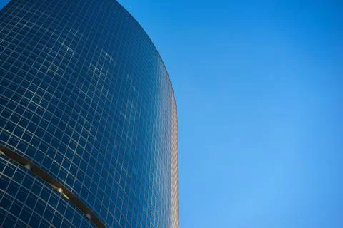 Underside angle view to background of modern glass building skyscrapers over Stock Photos