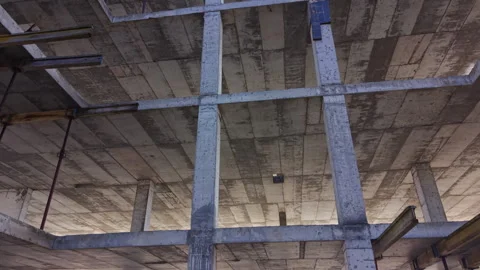Underside of concrete ceiling grid in unfinished building, Bulgaria Stock Footage 339665685