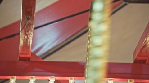 Underside detail of red and white striped carousel amusement ride 23.98fps Stock Footage 123818894