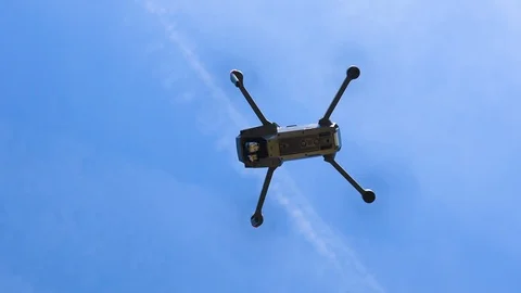 Underside of a drone flying in the air Stock Footage 91954396