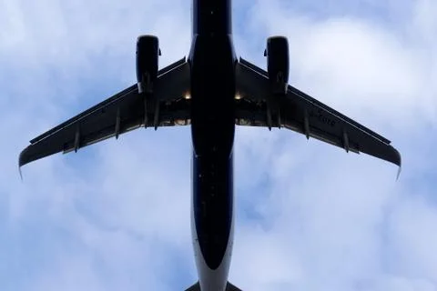 The underside of a modern airplane with its flaps Stock Photos