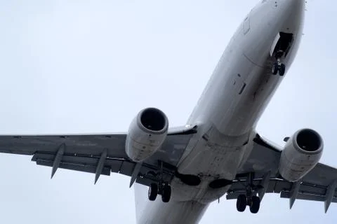 The underside of a modern airplane with its flaps Stock Photos