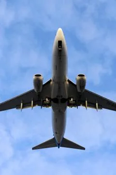 The underside of a modern airplane with its flaps Stock Photos