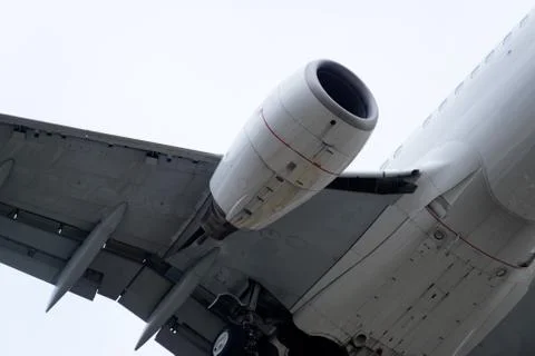 The underside of a modern airplane with its flaps Stock Photos
