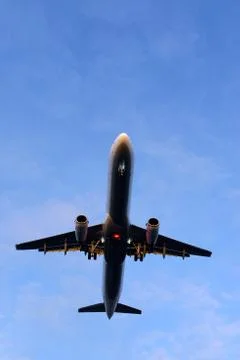 The underside of a modern airplane with its flaps Stock Photos