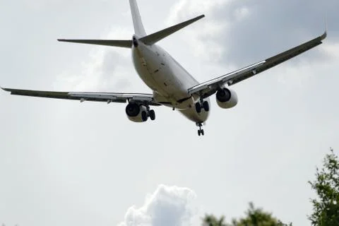The underside of a modern airplane with its flaps Stock Photos