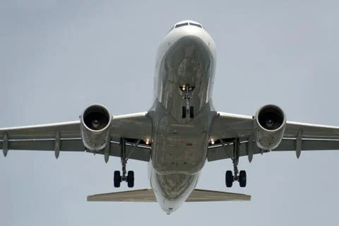 The underside of a modern airplane with its flaps Stock Photos