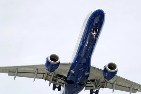 The underside of a modern airplane with its flaps Stock Photos