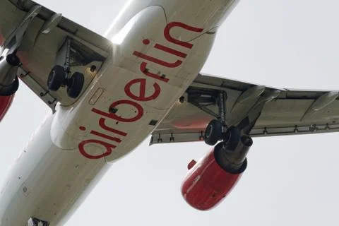 The underside of a modern airplane with its flaps Stock Photos
