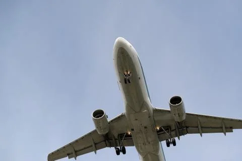 The underside of a modern airplane with its flaps Stock Photos