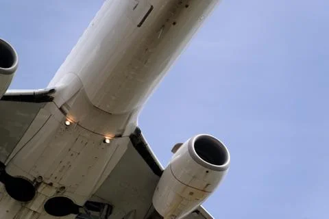 The underside of a modern airplane with its flaps Stock Photos